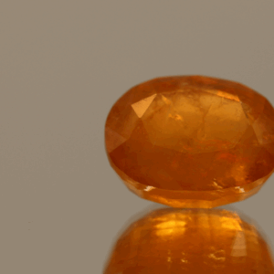 Natural Hackmanite gemstone, 6.71 ct, orange oval, untreated, certified AIG GEM20231110104162