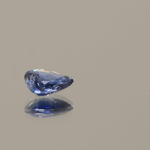 Blue pear-shaped sapphire, heat treated, unknown origin, 0.79 carat, dimensions 6.7 × 6.06 × 2.33 mm, AIG certified.