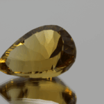 Natural pear cut citrine gemstone with yellow-orange color, 20.10 × 14.20 mm