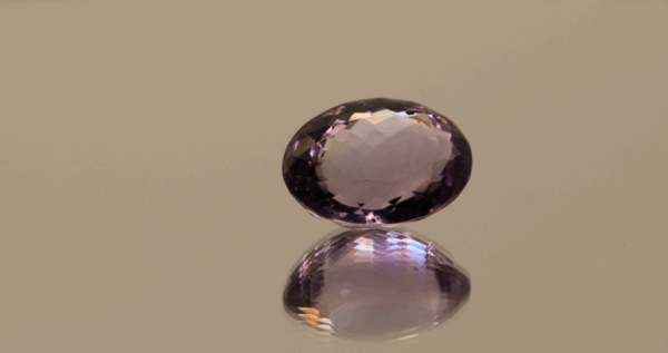 Natural oval cut amethyst gemstone with purple violet color, 15.00 × 11.50 mm
