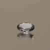 Violet green oval-shaped tanzanite, 0.58 carat, 6.95 × 4.9 × 2.52 mm, no treatment, unknown origin, GIA certified.