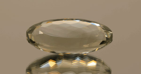 Natural prasiolite gemstone, 22.39 carat, oval cut, pale green color, untreated, loose gemstone, dimensions 26.8 × 13.5 × 9.1 mm, ideal for fine jewelry.