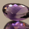 Natural oval cut amethyst gemstone with purple violet color, 20.70 × 14.00 mm
