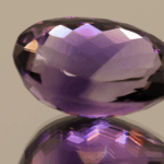 Natural oval cut amethyst gemstone with purple violet color, 20.70 × 14.00 mm