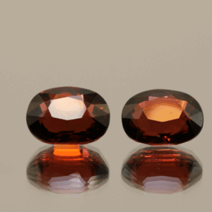 Set of 2 natural almandine garnets, 5.92 carats total, oval cut, purple-red color, untreated