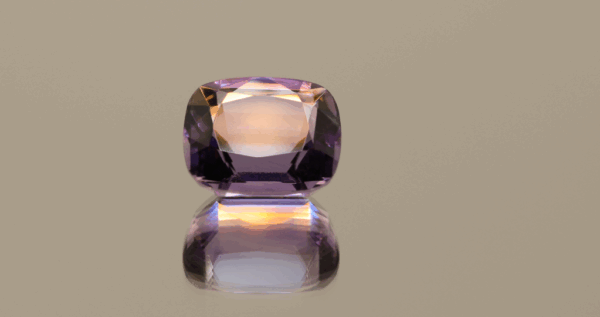 Natural cushion cut amethyst gemstone with purple violet color, 12.60 × 10.80 mm