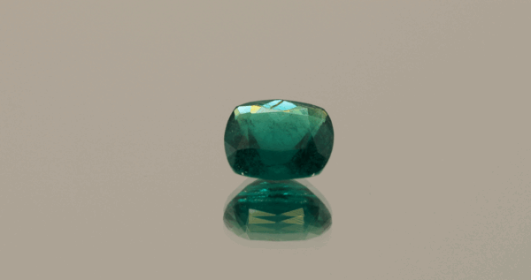 Natural green Hauyne gemstone, cushion cut, certified by AIG.