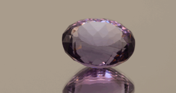 Natural oval cut amethyst gemstone with purple violet color, 14.50 × 12.20 mm
