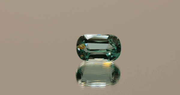 Light green cushion-shaped spodumene, 4.94 carat, 11.8 × 7.1 × 6.7 mm, no treatment, unknown origin.