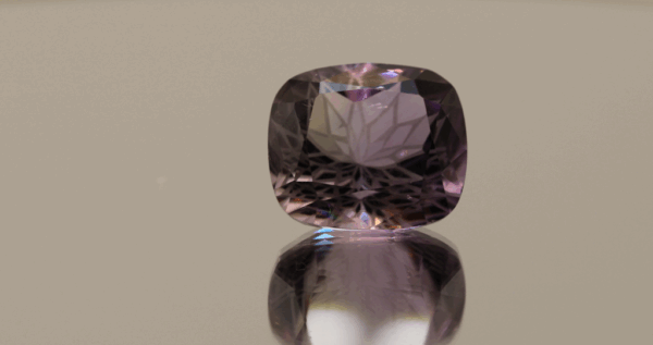 Natural cushion cut amethyst gemstone with purple violet color, 15.69 × 13.76 mm