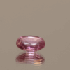 Pink sapphire gemstone 1.10 carat oval cut, heat treated, loose gemstone, dimensions 7.17 × 5.20 × 2.86 mm, IGS certified.