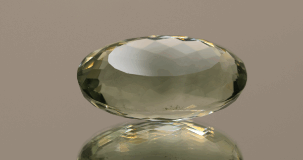 Natural prasiolite gemstone, 26.16 carat, oval cut, pale green color, untreated, loose gemstone, dimensions 24.3 × 13.9 × 11.1 mm, ideal for fine jewelry.