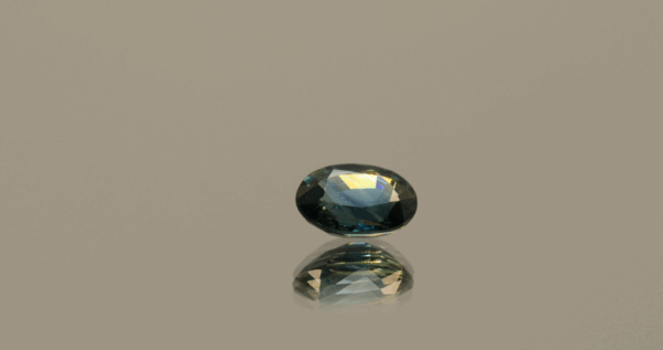 Natural sapphire gemstone, 0.96 carat, oval cut, blue color, untreated, loose gemstone, dimensions 6.78 × 5.03 × 3.20 mm, origin Madagascar, GFCO certified.