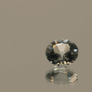 Light blue round sapphire, heat treated, Madagascar origin, 1.05 carat, dimensions 6.4 × 6.33 × 3.66 mm, AIG certified.