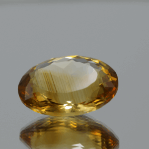 Natural oval cut citrine gemstone with yellow-orange color, 16.80 × 13.10 mm Title: