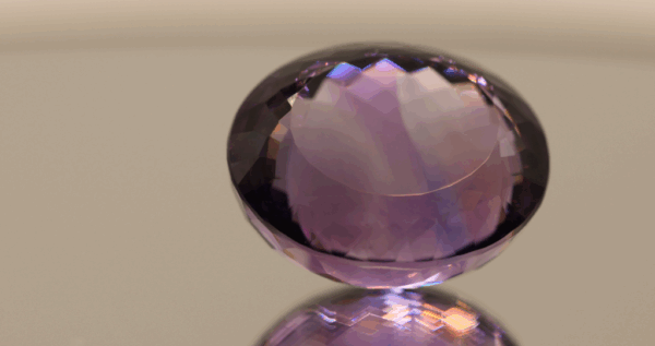 Natural oval cut amethyst gemstone with purple violet color, 23.50 × 19.80 mm