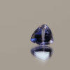 Violet triangular-shaped tanzanite, 0.84 carat, 6.37 × 6.72 × 3.62 mm, no treatment, unknown origin, GIA certified.