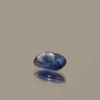Natural sapphire gemstone, 0.6 carat, oval cut, blue color, heat-treated, loose gemstone, dimensions 6.56 × 4.45 × 2.09 mm, origin unknown, AIG certified.