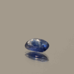 Natural sapphire gemstone, 0.6 carat, oval cut, blue color, heat-treated, loose gemstone, dimensions 6.56 × 4.45 × 2.09 mm, origin unknown, AIG certified.