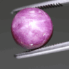 Natural star ruby gemstone, 9.28 carat, cabochon cut, red-purple color, unheated, loose gemstone, dimensions 10.36 × 10.3 × 7.09 mm, origin unknown, GFCO certified.