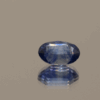 Blue sapphire gemstone, oval shaped, 1.18 carat, 7.40 × 4.86 × 3.83 mm, heat-treated, unknown origin, IGI certified.