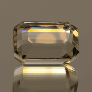 Light yellow octagon-shaped spodumene, 21.55 carat, 17.6 × 12 × 10.7 mm, no treatment, unknown origin.