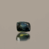 Natural sapphire gemstone, 0.89 carat, cushion cut, greenish blue color, unheated, loose gemstone, dimensions 5.63 × 4.74 × 3.43 mm, origin Madagascar, GFCO certified.