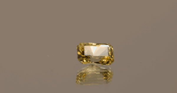 Natural sapphire gemstone, 1.18 carat, octagon cut, yellow color, unheated, loose gemstone, dimensions 6.31 × 4.37 × 3.92 mm, origin unknown, ALGT certified.