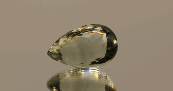 Natural prasiolite gemstone, 11.71 carat, pear cut, pale green color, untreated, loose gemstone, dimensions 17.8 × 11.6 × 9.6 mm, ideal for fine jewelry.