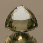 Natural prasiolite gemstone, 21 carat, trillion cut, pale green color, untreated, loose gemstone, dimensions 16.9 × 16.6 × 12.7 mm, ideal for fine jewelry.