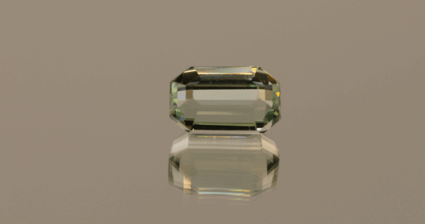 Light green octagon-shaped spodumene, 6.85 carat, 12.5 × 8 × 7.3 mm, no treatment, unknown origin.