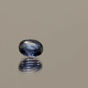 Natural Unheated Sapphire blue gemstone, 0.77 carat, oval cut, blue color, untreated, loose gemstone, dimensions 5.38 × 4.71 × 3.16 mm, origin Madagascar, AIG certified.