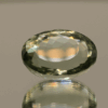 Natural prasiolite gemstone, 14.51 carat, oval cut, pale green color, untreated, loose gemstone, dimensions 18 × 12.7 × 9.8 mm, ideal for fine jewelry.