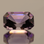 Natural octagon cut amethyst gemstone with purple violet color, 18.80 × 11.93 mm