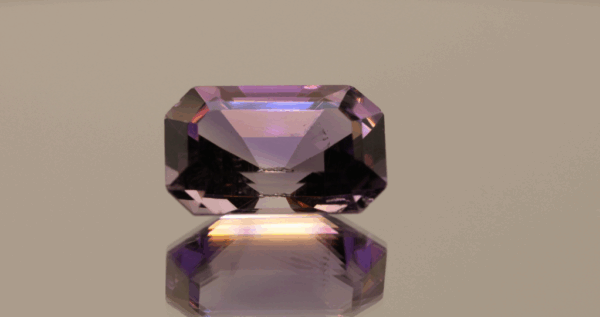 Natural octagon cut amethyst gemstone with purple violet color, 18.80 × 11.93 mm
