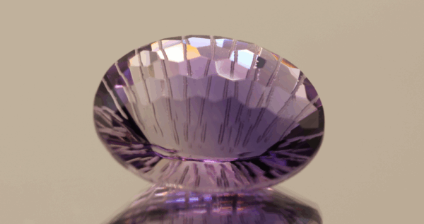 Natural oval cut amethyst gemstone with purple violet color, 19.90 × 11.70 mm