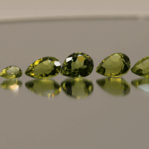Natural peridot set, total weight 11.56 carat (12 stones), pear cut, yellowish green color, untreated, loose gemstones, dimensions 5.8–9.2 × 3.8–6.6 × 2.7–4.7 mm, ideal for fine jewelry.