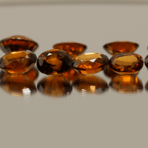 Natural hessonite garnet gemstones 23 carats mixed cuts orange color untreated loose stones set