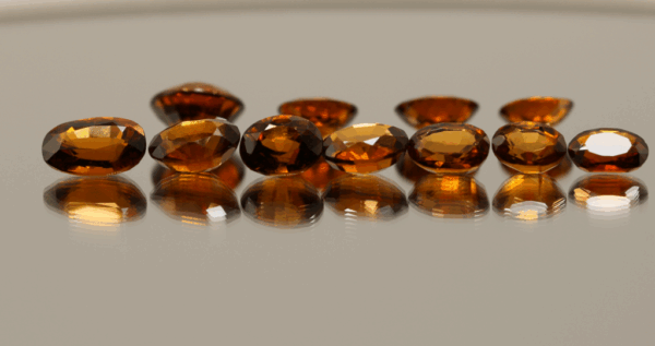 Natural hessonite garnet gemstones 23 carats mixed cuts orange color untreated loose stones set