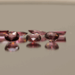 Natural rhodolite garnet gemstones 5.1 carats mixed cuts light purple color untreated loose stones set