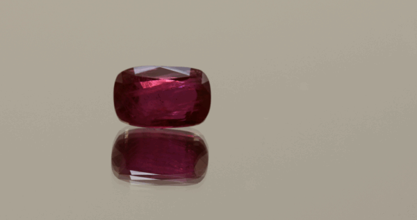 Natural red ruby gemstone, 3.32 carat, rectangular cut, vivid deep red color, minor oil treatment, loose gemstone, dimensions 10.03 × 6.4 × 4.53 mm, origin unknown, IGE certified.