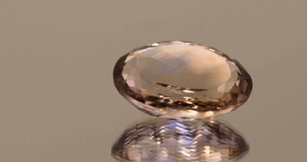 Natural oval cut ametrine gemstone with purple yellow color, 20.30 × 16.30 mm