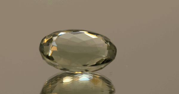 Natural prasiolite gemstone, 14.31 carat, oval cut, pale green color, untreated, loose gemstone, dimensions 19.2 × 12.9 × 8.4 mm, ideal for fine jewelry.