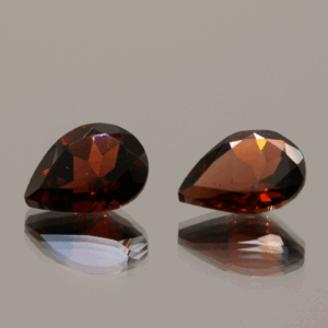Natural spessartite garnets, 3.64 carats each, pear cut, orange-red color, untreated, set of 2