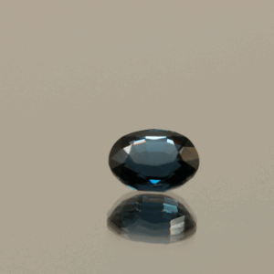 Deep blue oval-shaped spinel stone blue, 1.30 carat, 7.17 × 5.84 × 3.72 mm, no treatment, unknown origin, ALGT certified.