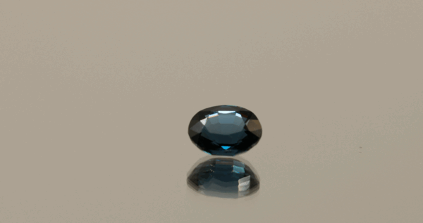 Deep blue oval-shaped spinel stone blue, 1.30 carat, 7.17 × 5.84 × 3.72 mm, no treatment, unknown origin, ALGT certified.