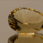 Brownish yellow pear-shaped smoky quartz, 26.46 carat, 26.3 × 16.6 × 12.0 mm, no treatment, unknown origin.
