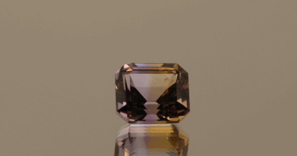 Natural octagon cut ametrine gemstone with purple yellow color, 10.70 × 9.50 mm