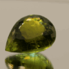 natural paraiba tourmaline IGI gemstone 15.94 carat yellowish green pear cut 18.42x14.82x9.75 mm IGI certified