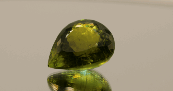 natural paraiba tourmaline IGI gemstone 15.94 carat yellowish green pear cut 18.42x14.82x9.75 mm IGI certified